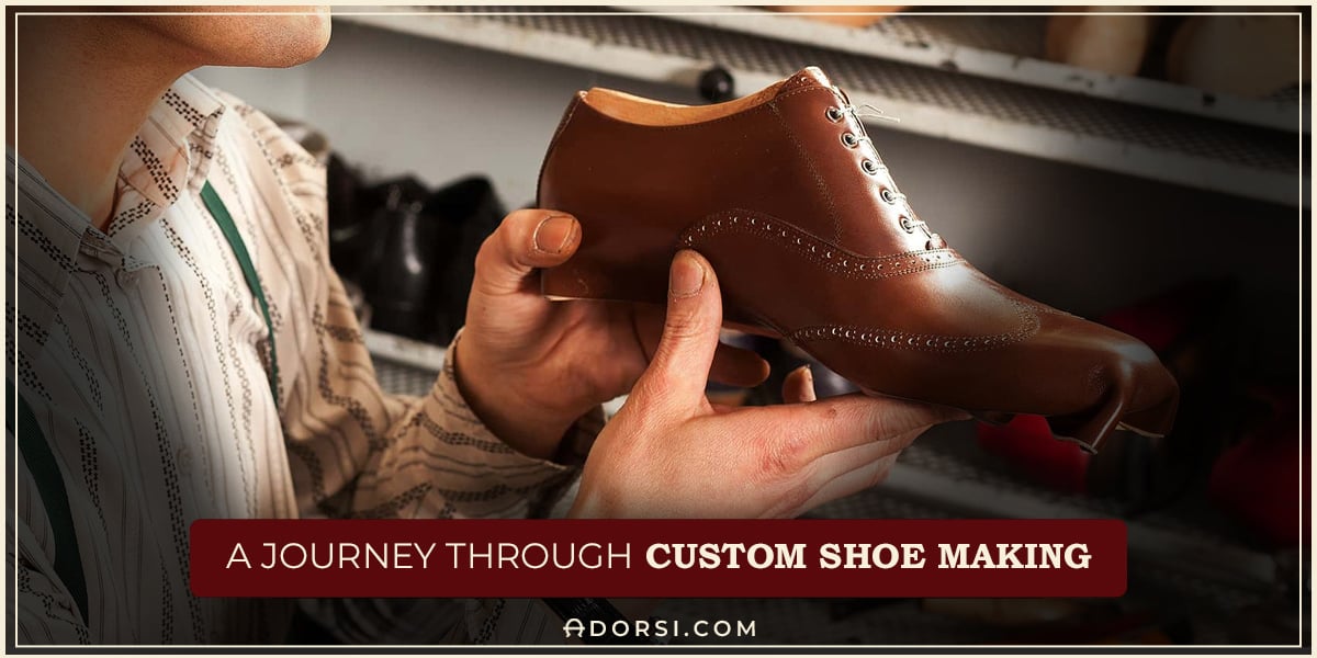 hand holds a custom made shoe showing the journey of the custom made shoes 