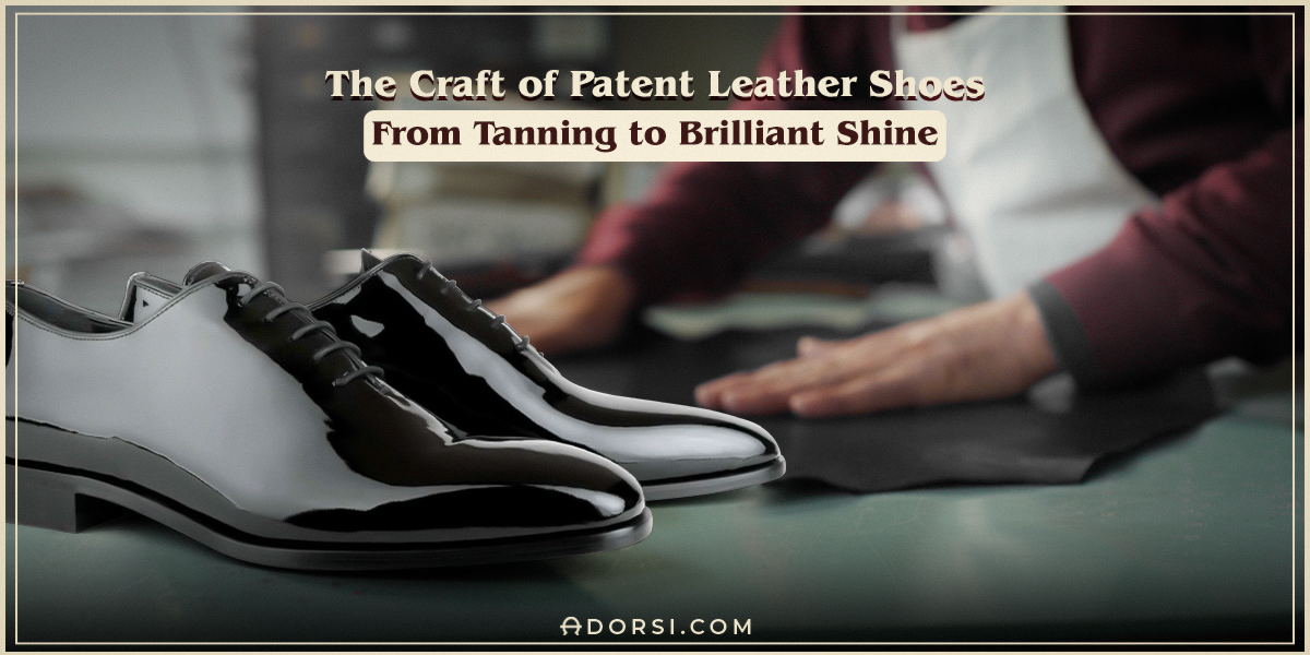 Showing the patent leather shoes in the front of the page and man's hand as he custom made it 