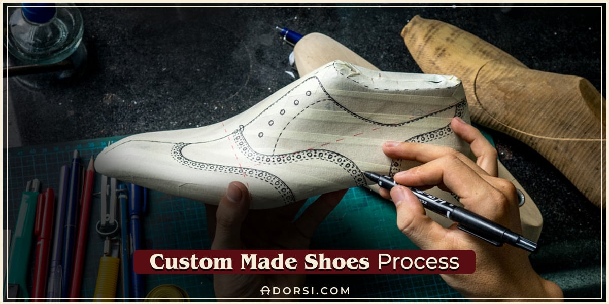 hands drawing on a shoe to design it as a custom made shoes 